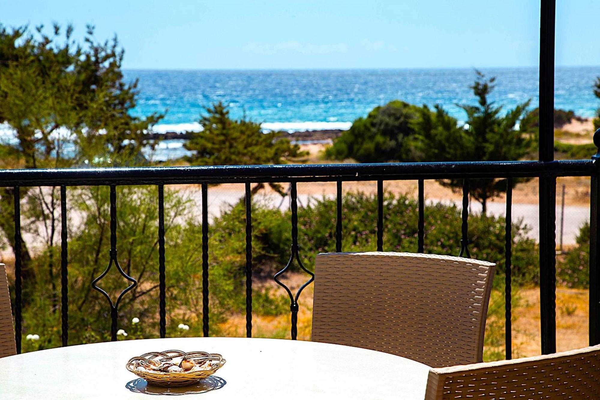 Romanos Beach Villas Exterior photo